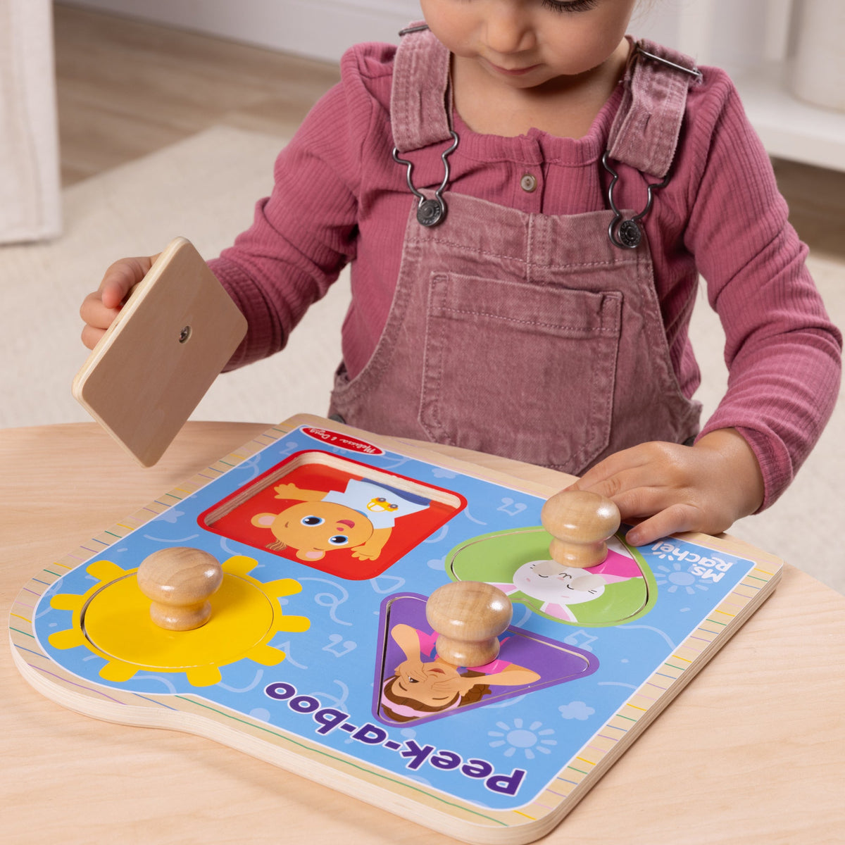 Ms. Rachel™ Wooden Peek-a-Boo Jumbo Peg Puzzle – 4 Pieces K0