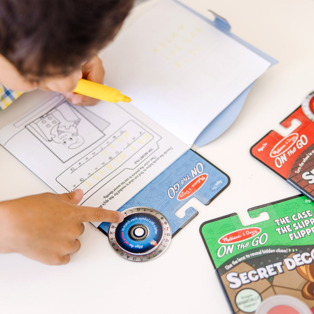 On the Go™ Secret Decoder Activity Books 3-Pack: Slippery Flippers, Runaway Ruby, Game Book Q7